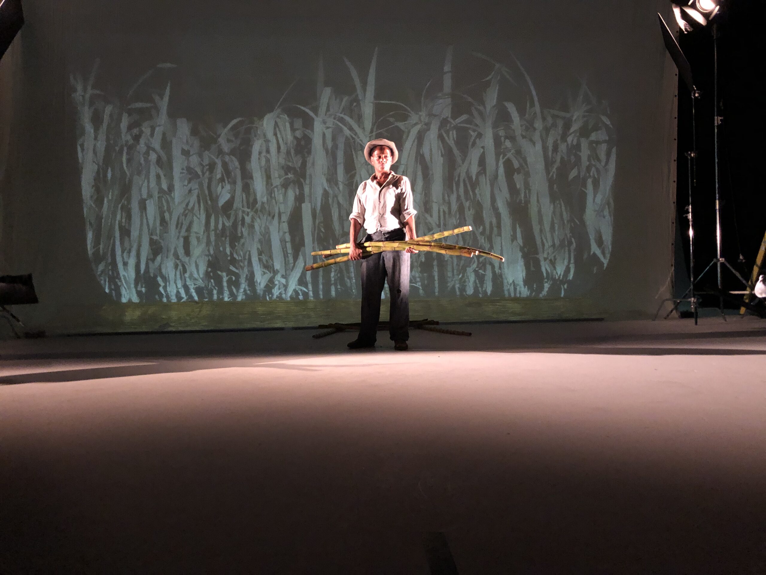 A production image taken from Behind the Scenes of Turning Point of a worked holding cane